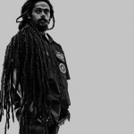 Damian Marley 0n Top Of BillBoard